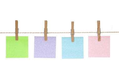 Colored reminder notes on string line with pegs clipart