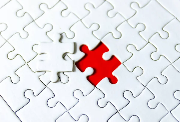 Fill the missing parts fragment of white jigsaw concept puzzle for succeed