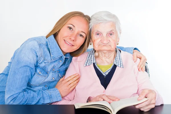 Elderly woman with grandchild — Stock Photo, Image