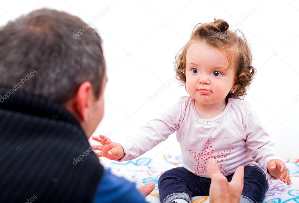 Adorable baby and her father