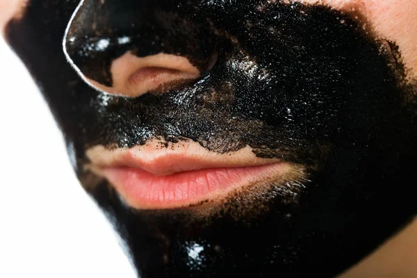 Facial black mask — Stock Photo, Image