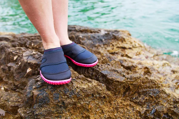 Woman in water shoe — Stock Photo, Image