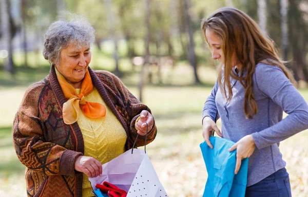 Happy elderly woman with her daughter — Stock Photo, Image