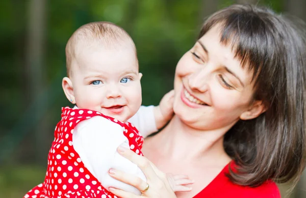 Adorable baby girl and her mother — Stock Photo, Image