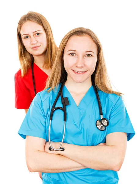 Smiling young female doctors — Stock Photo, Image