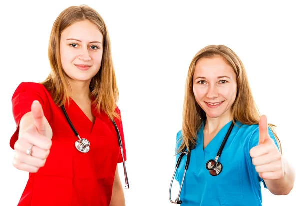 Smiling young female doctors — Stock Photo, Image