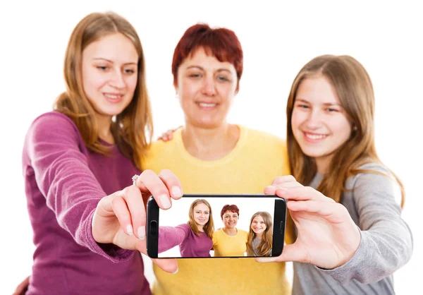 Onnellinen äiti tyttärien kanssa — kuvapankkivalokuva