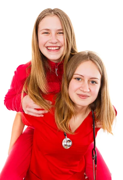 Junge Ärztin und ihre Schwester — Stockfoto