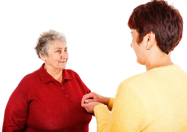 Mujer anciana y cuidador joven — Foto de Stock