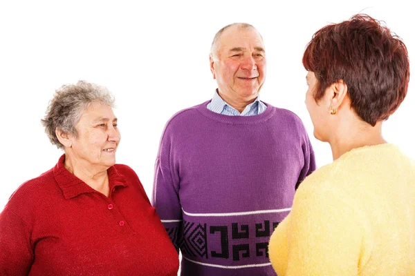 Elderly couple and young caregiver — Stock Photo, Image