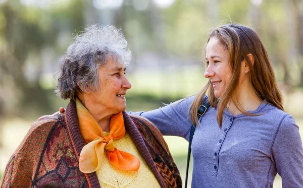 Happy elderly woman with her daughter — Stock Photo, Image