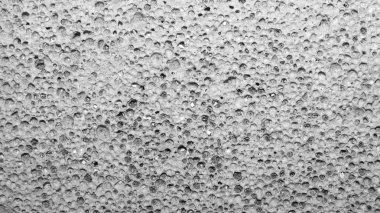 Pomzanın gözenekli dokusu. Gözenekli pomzanın arka planı.