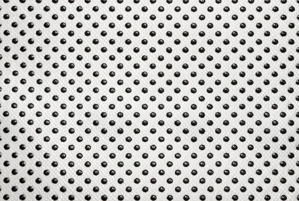 White fabric texture in black dot.White fabric background with black polka dots.