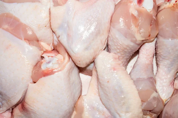 Çiğ Taze Tavukların Arka Planı Tavuk Inciği Kalça Kanatlar — Stok fotoğraf