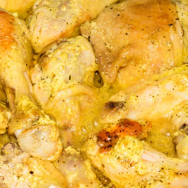 The chicken in the marinade.Pickled chicken thighs.Background of the chicken in the marinade.Marinated chicken drumstick.