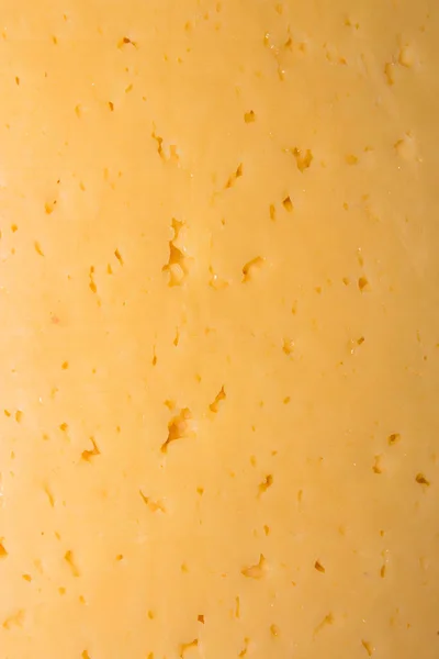 チーズと穴チーズチーズの背景チーズの食感 — ストック写真