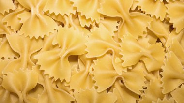 Kelebek şeklinde makarna. Makarna arkaplanı..
