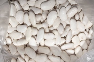 Beyaz fasulye. Beyaz fasulye sosu. Beyaz fasulye arkaplanı..