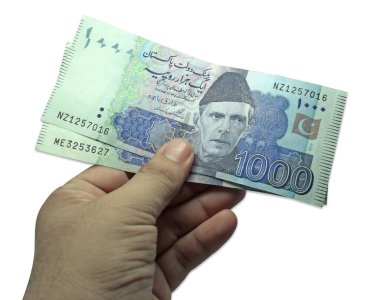 El ele tutuşma parası beyaz arka planda izole edilmiş, Pakistan para birimi