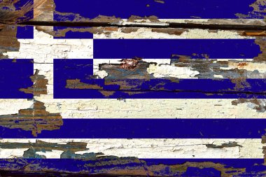 Yunanistan bayrağını eski tahtaya dikti.