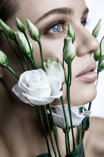 Calm Beauty Fashion Model Woman face. Portrait with white Rose flower. 