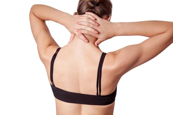 Nahaufnahme einer jungen Frau mit Schulter- oder Nackenschmerzen. — Stockfoto