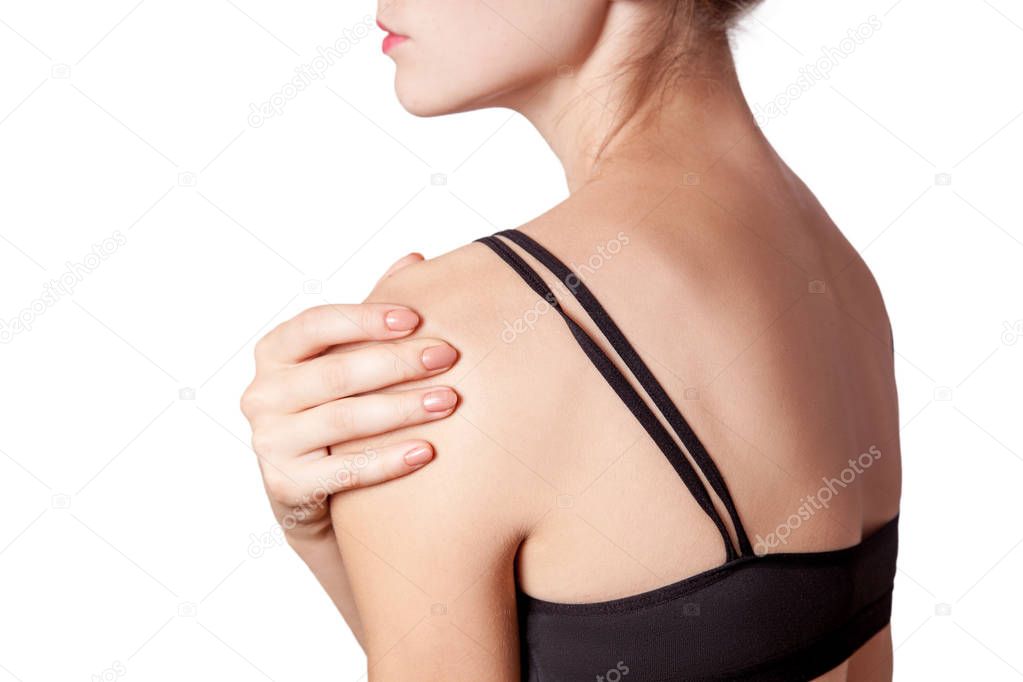 young woman with pain on her arm and shoulder.