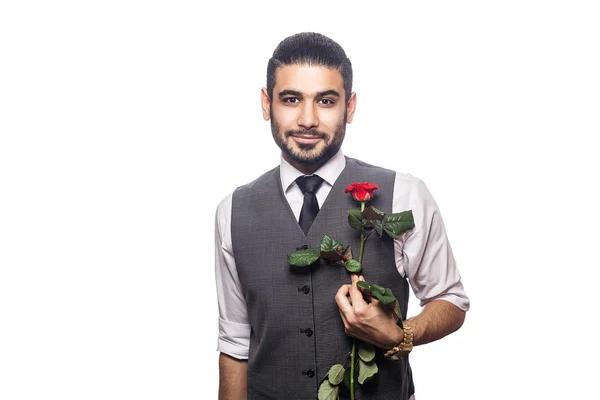 Bonito romântico homem feliz com flor de rosa . — Fotografia de Stock