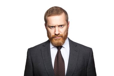 Kameraya bakarak mutsuz mutsuz işadamı.