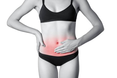 Portre manzara mide ağrısı veya sindirim veya dönem döngüsü ile genç bir kadın. Beyaz arka plan üzerinde izole. Siyah ve beyaz fotoğraf kırmızı nokta.