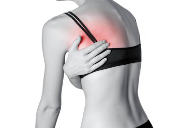 Closeup görünümü arka tarafta ağrı ile genç bir kadın. Beyaz arka plan üzerinde izole. Siyah ve beyaz fotoğraf kırmızı nokta.