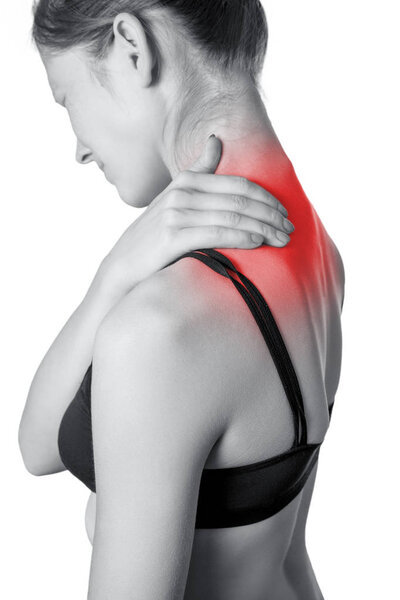 Closeup view of a young woman with shoulder or neck pain. isolated on white background. Black and white photo with red dot
