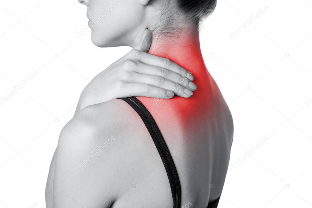 Closeup view of a young woman with shoulder or neck pain. isolated on white background. Black and white photo with red dot