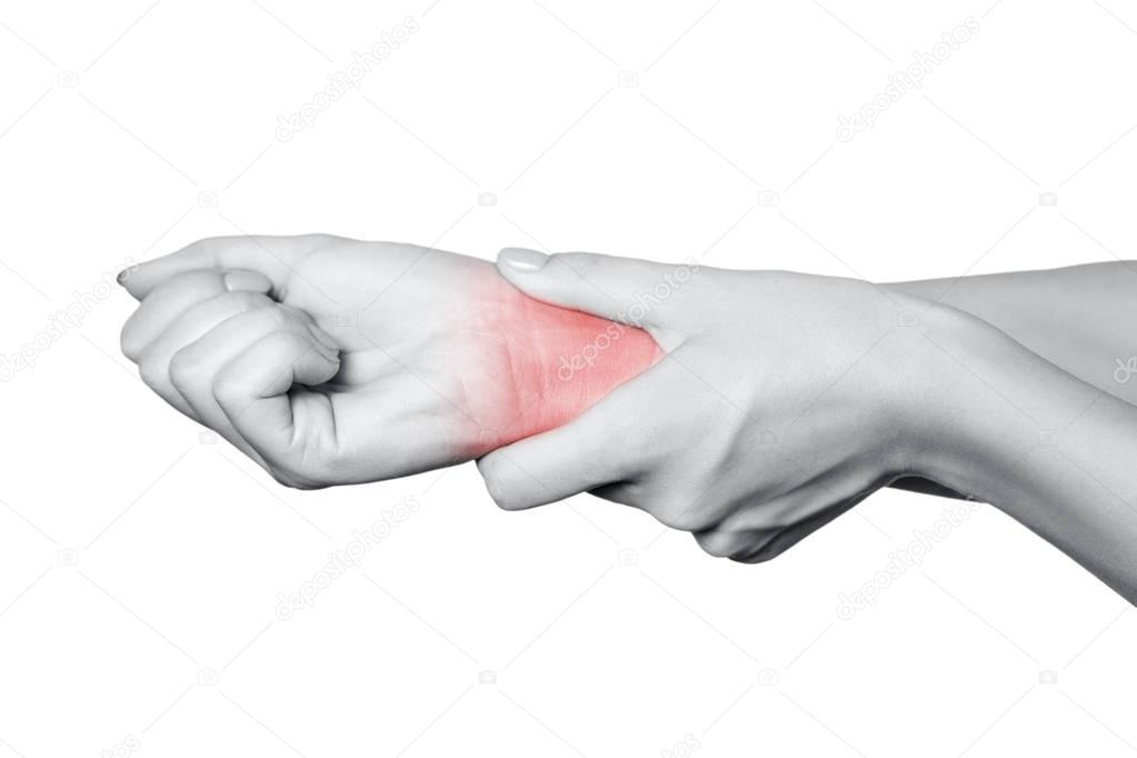 Closeup view of a young woman with pain on hand. isolated on white background. Black and white photo with red dot.