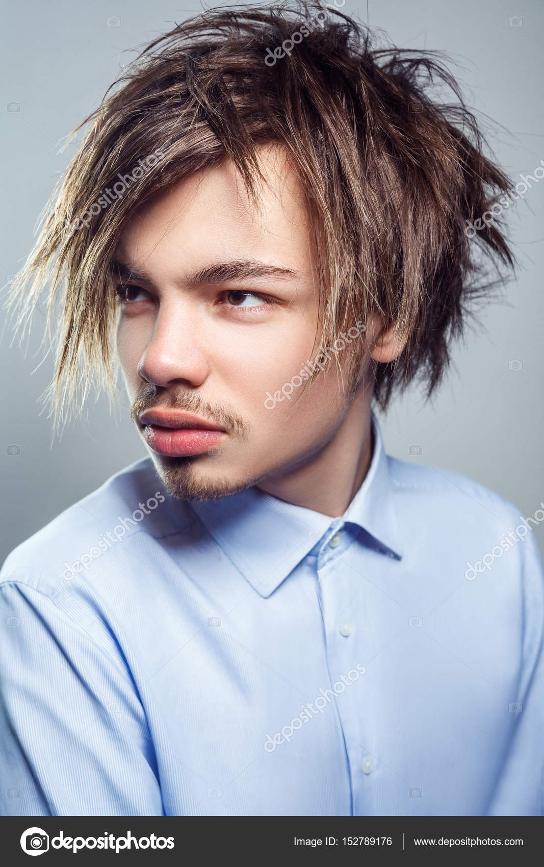 Spiky Haircuts With Long Bangs Portrait Of Young Man With Fringe