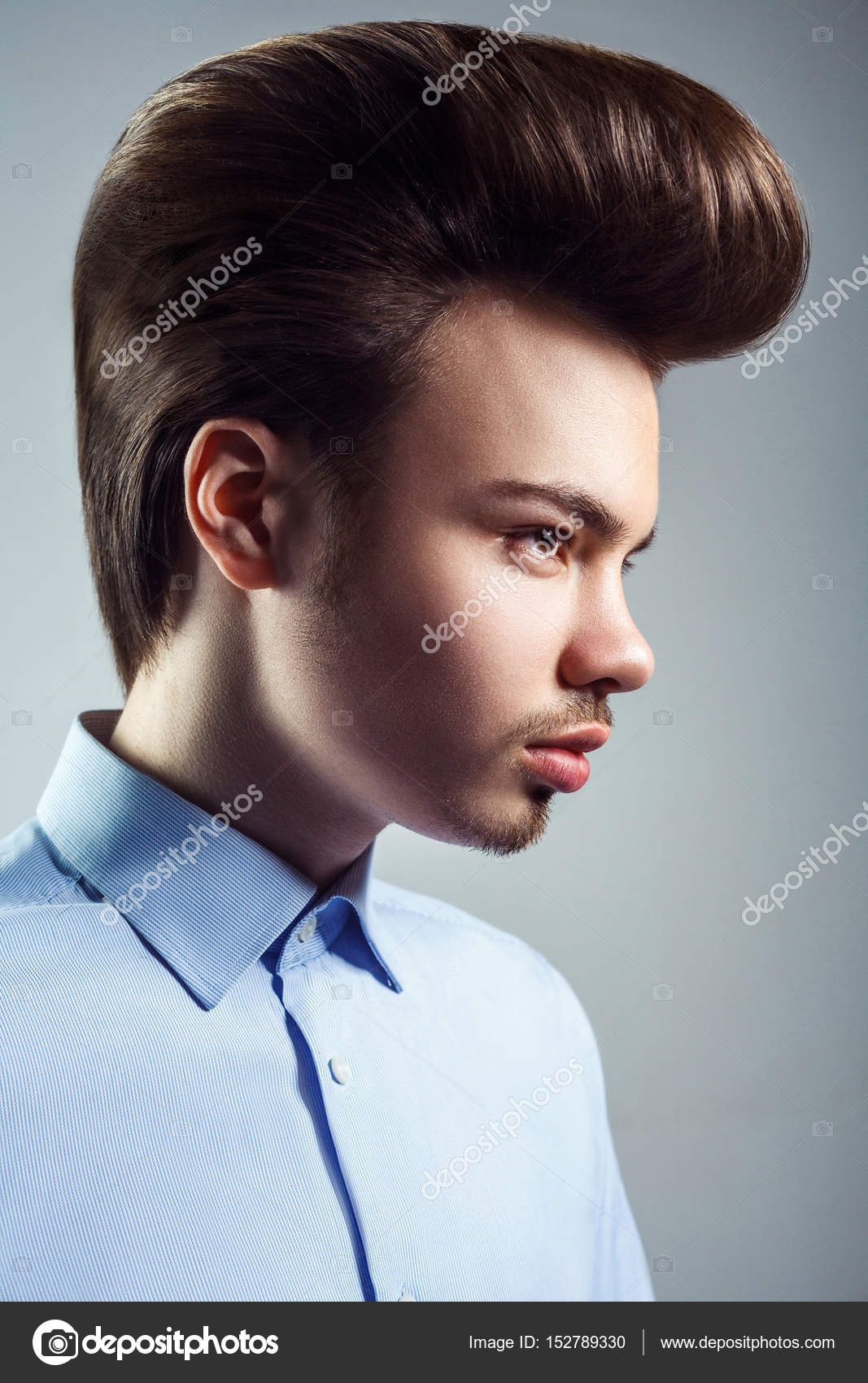 Side view of young man with retro classic pompadour hairstyle. studio shot. Stock Photo by ©khosrork 152789330 Side view of young man with retro classic pompadour hairstyle. studio shot. Stock Photo by ©khosrork 152789330