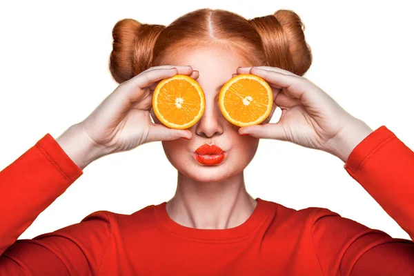 Young beautiful girl with orange. — Stock Photo, Image