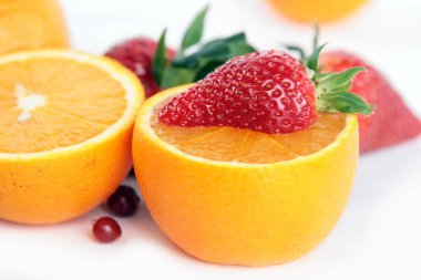 Strrawberry on orange. Season fruits clipart
