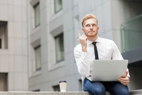 I have idea! Handsome ginger businessman with beard looking up and finger up. — Stock Photo, Image