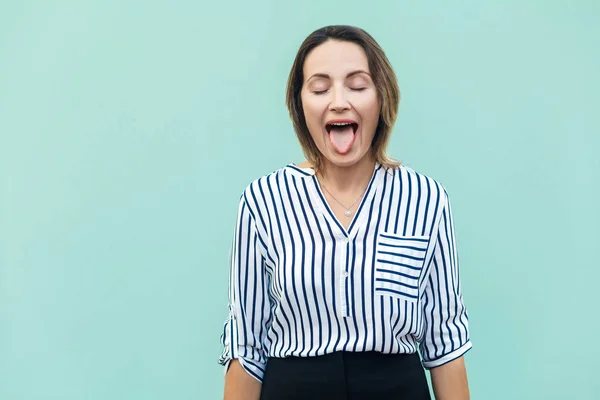 Happiness businesswoman closing eyes and tongue out. — Stock Photo, Image