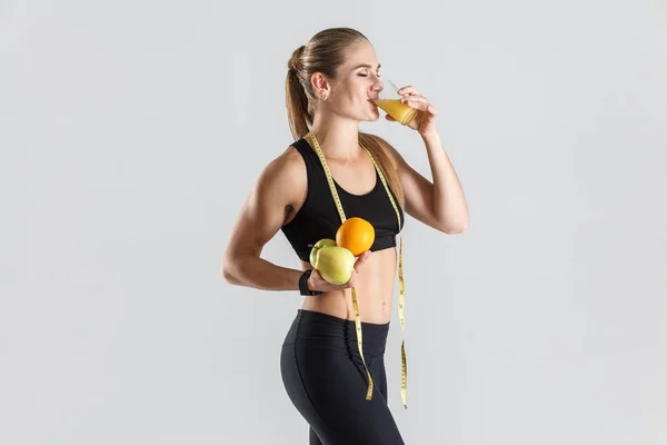 Woman drinking juice — Stock Photo, Image