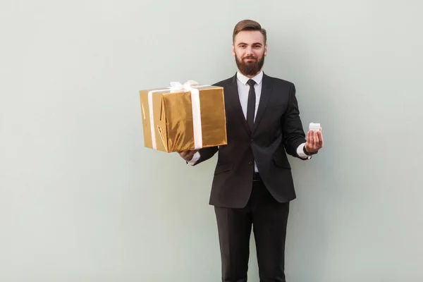 Emotional Businessman Holding Hands Gift Boxes Choice Concept — Stock Photo, Image