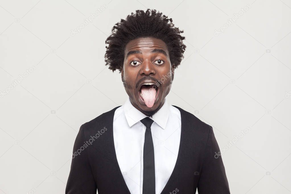 Crazy African American Businessman Looking Camera Showing Tongue Out ...