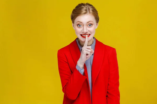 Smiling Redhead Businesswoman Red Jacket Young Showing Shh Sing Looking — Stock Photo, Image