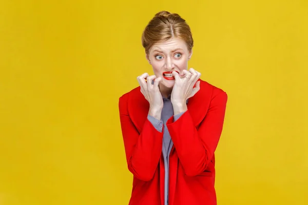 Worry Businesswoman Gnawing Nails Looking Camera Hope Yellow Background — Stock Photo, Image