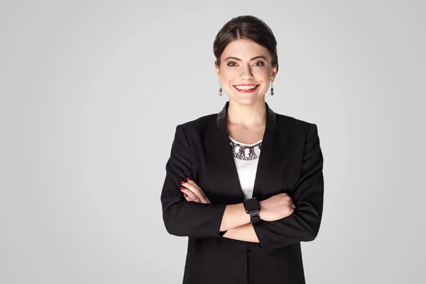 Happy Smiling Businesswoman Crossed Hands Looking Camera Grey Background — Stock Photo, Image