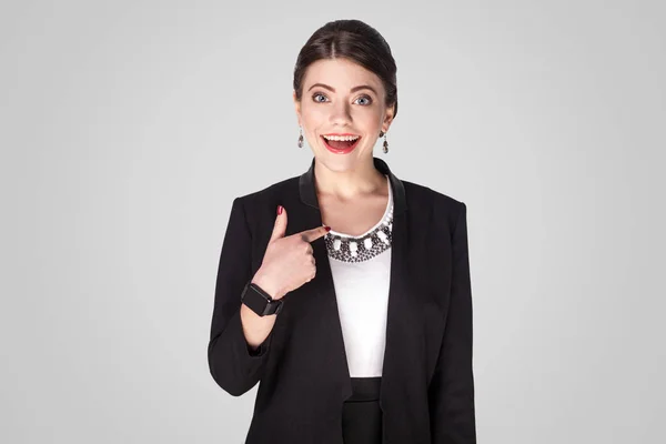 Surprised Businesswoman Pointing Finger Himself Toothy Smile Grey Background — Stock Photo, Image