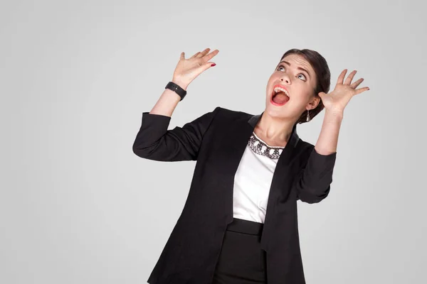 Shocked Woman Raised Hands Looking Shouting Grey Background — Stock Photo, Image