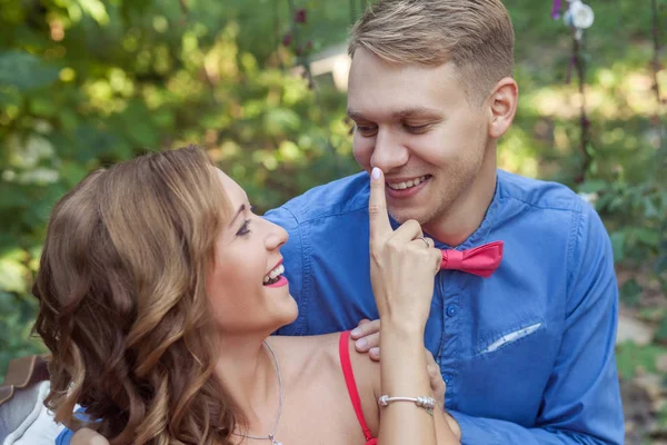 Beautiful Woman Touching Finger Nose Man Smiling Spring Park Love — Stock Photo, Image