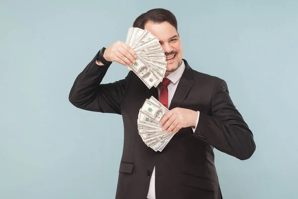 Homem Negócios Feliz Segurando Notas Dólar Fundo Azul Claro — Fotografia de Stock